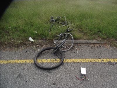 Bike smashed after car accident