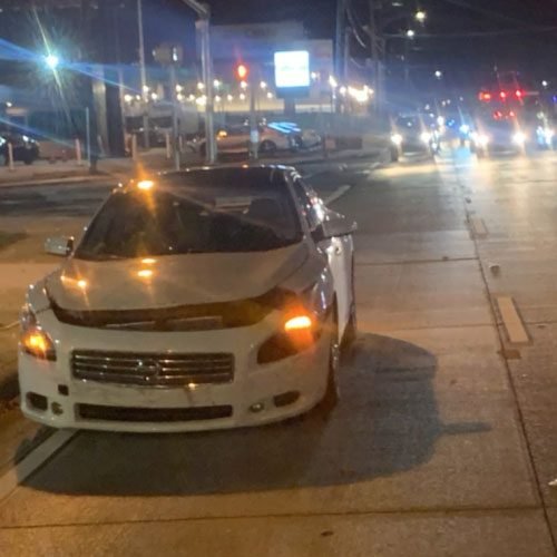 damaged car at night